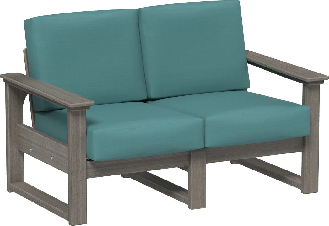 This image shows the deep seating loveseat on a white background. The frames are coastal gray and the cushions are cast breeze.