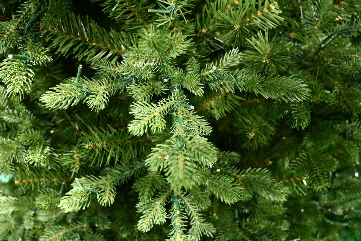 Up close view of the life like branches on this artificial noble fir tree.