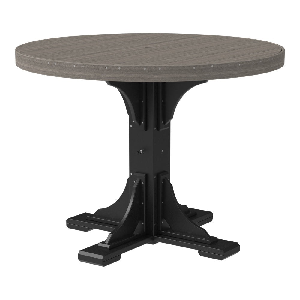 This is the Coastal Gray and Black colored round dining table on a white background.