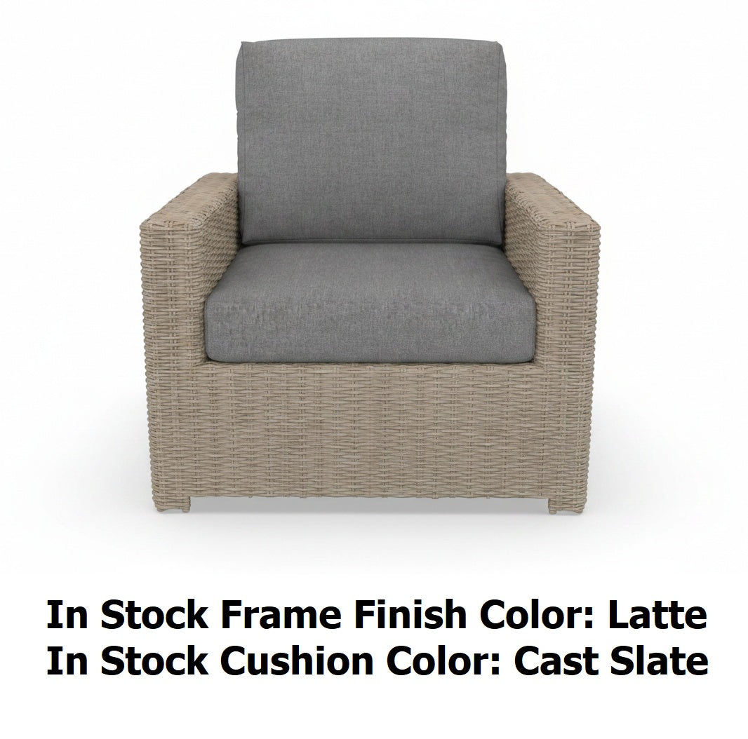 This image shows what the lounge chair looks like on a white background. The photo reads "In stock frame finish color: Latte. In stock cushion color: Cast Slate."