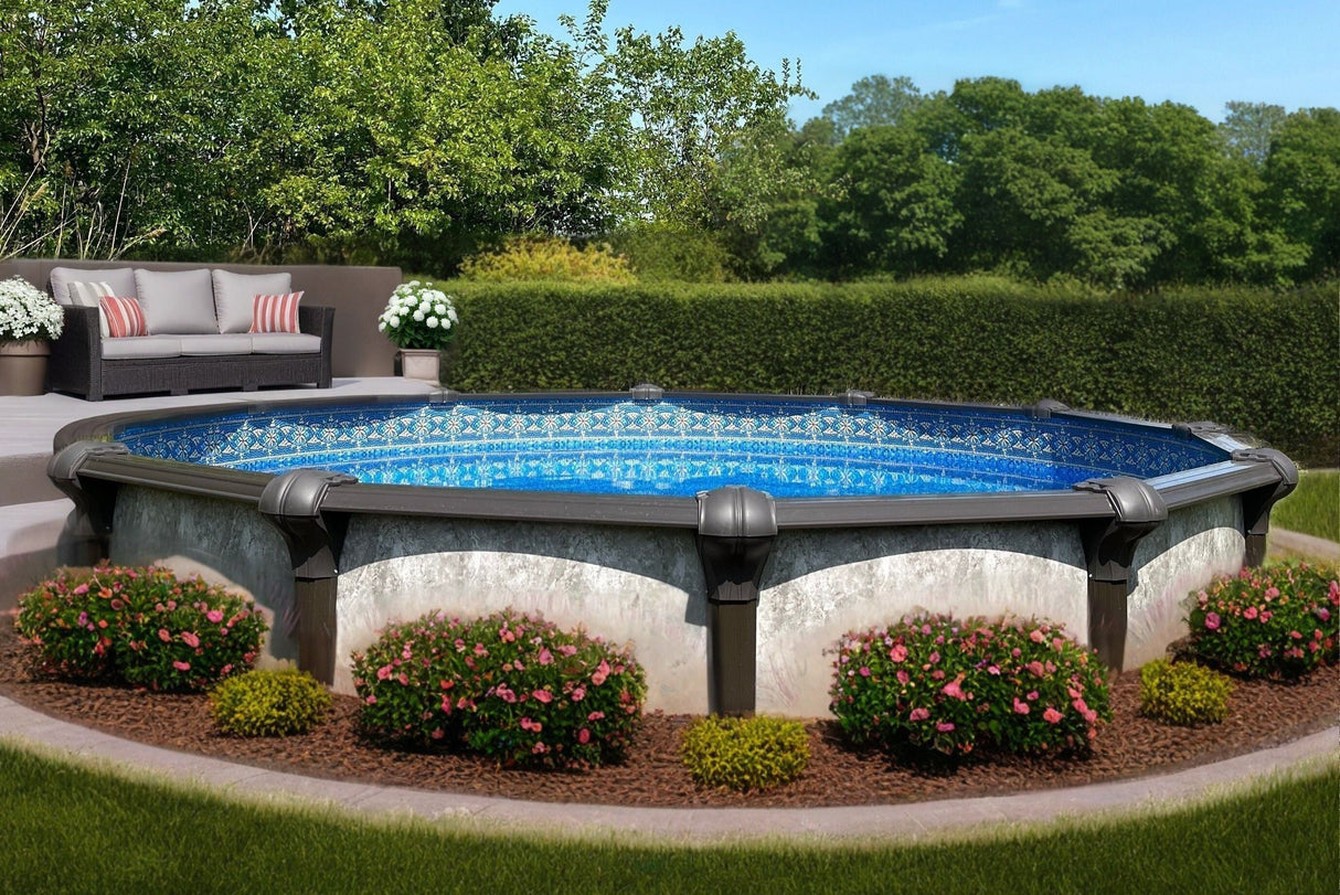 Garden with a pool, flowers, and outdoor furniture under a clear blue sky.