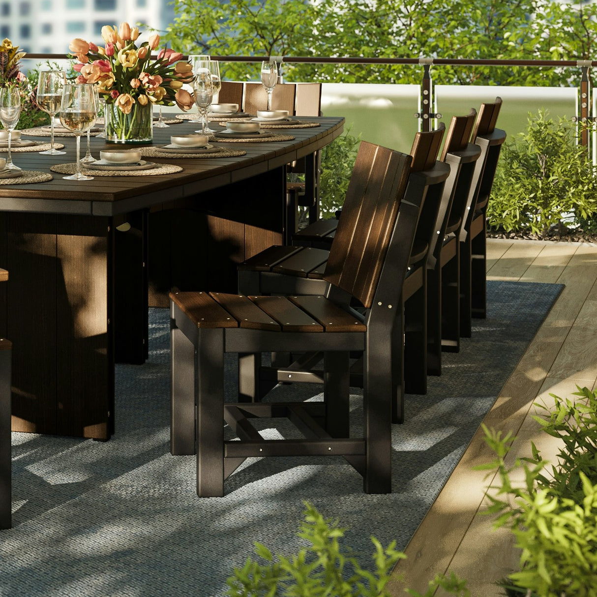 This is a lifestyle image showing Brazilian Walnut and Black colored Urban Side Chairs surrounding a matching dining table.