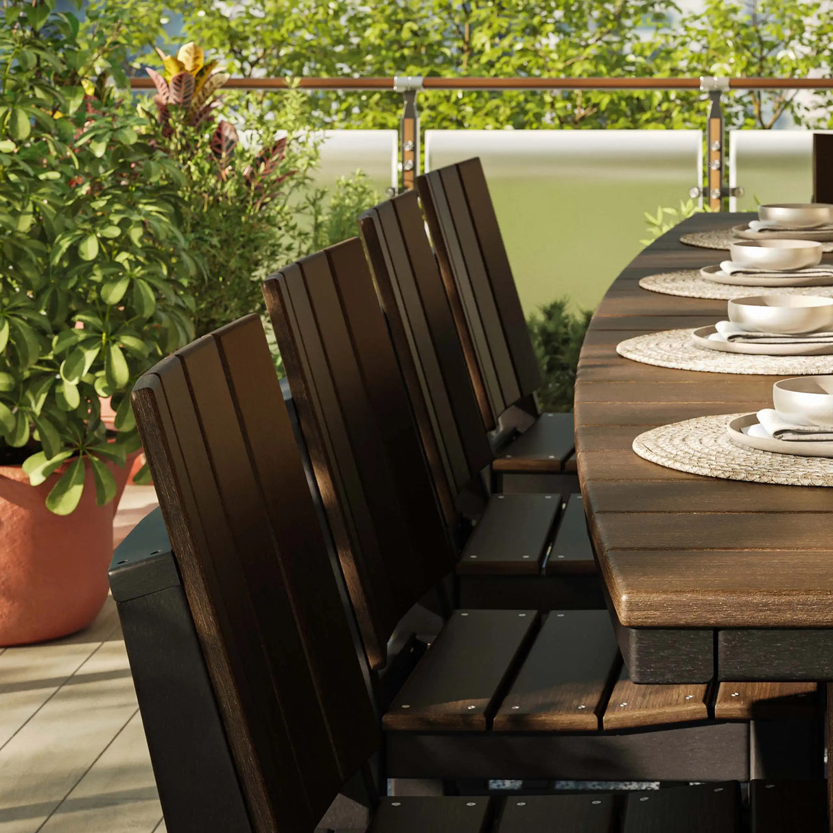 This is a lifestyle image showing Brazilian Walnut and Black colored Urban Side Chairs surrounding a matching dining table.
