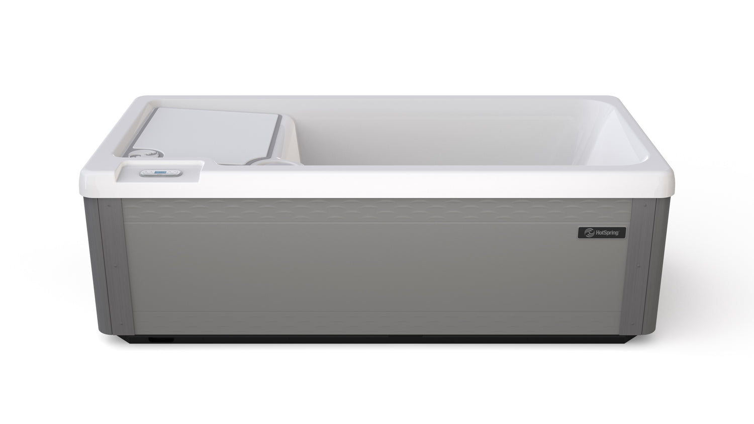 Long, rectangular tub designed for a cold plunge. The cabinet color is a tan-ish gray color and the inside is white. There's one seat.