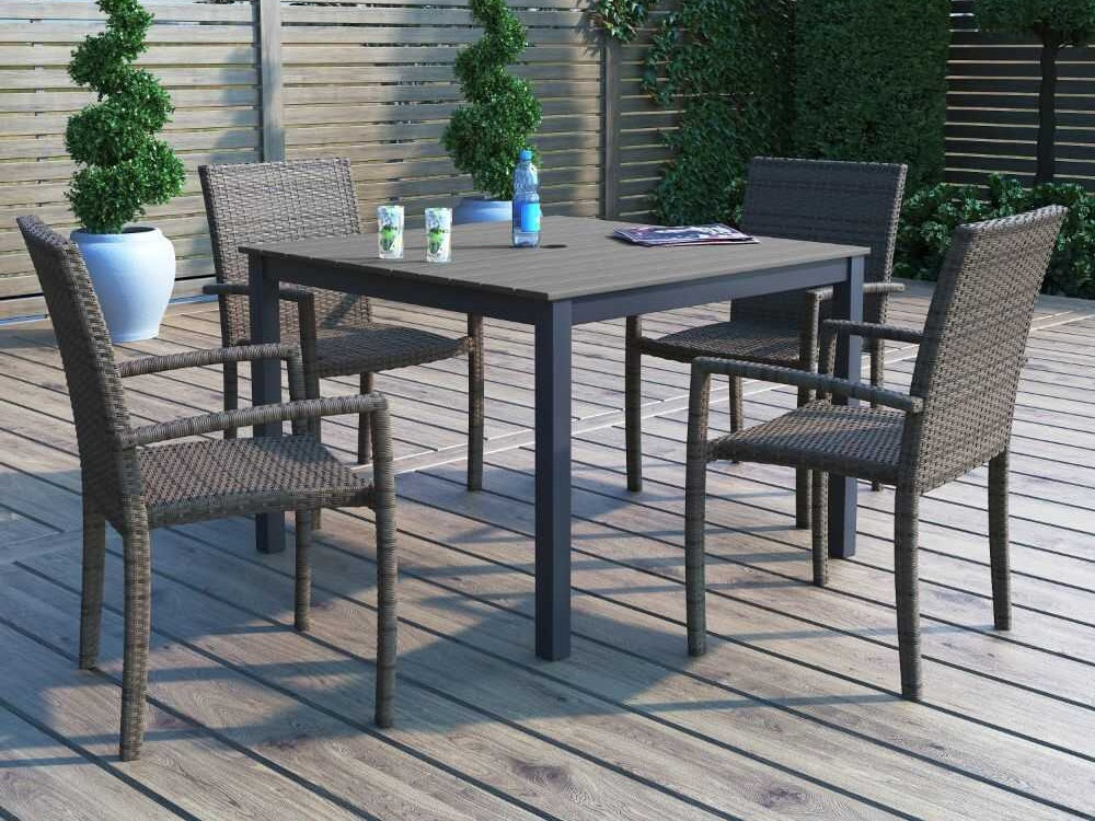 This image shows this patio dining set on a wooden deck.