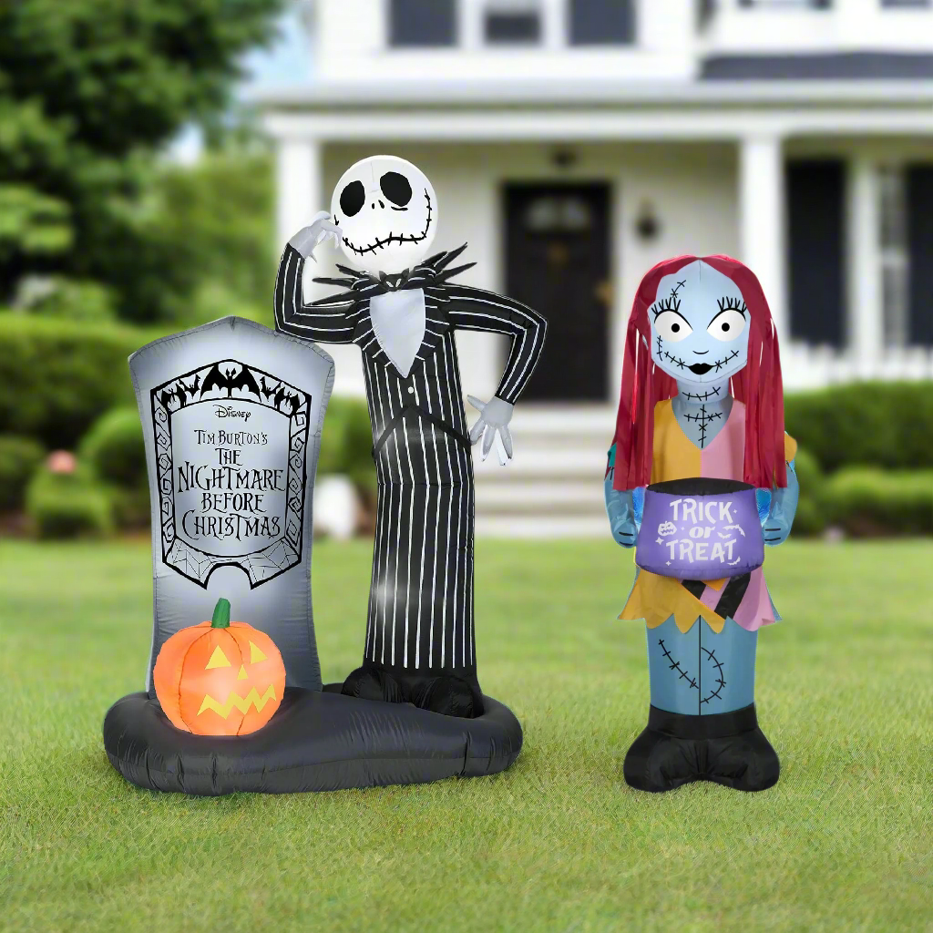 This image shows the two inflatables that come in this combo pack. They're set up in front of a house in the grass.