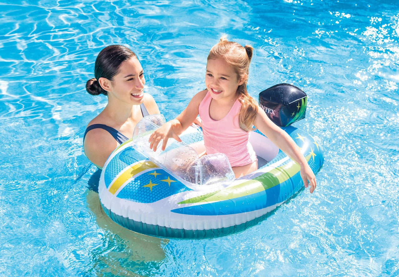 Pool inflatable shaped like a speedboat.