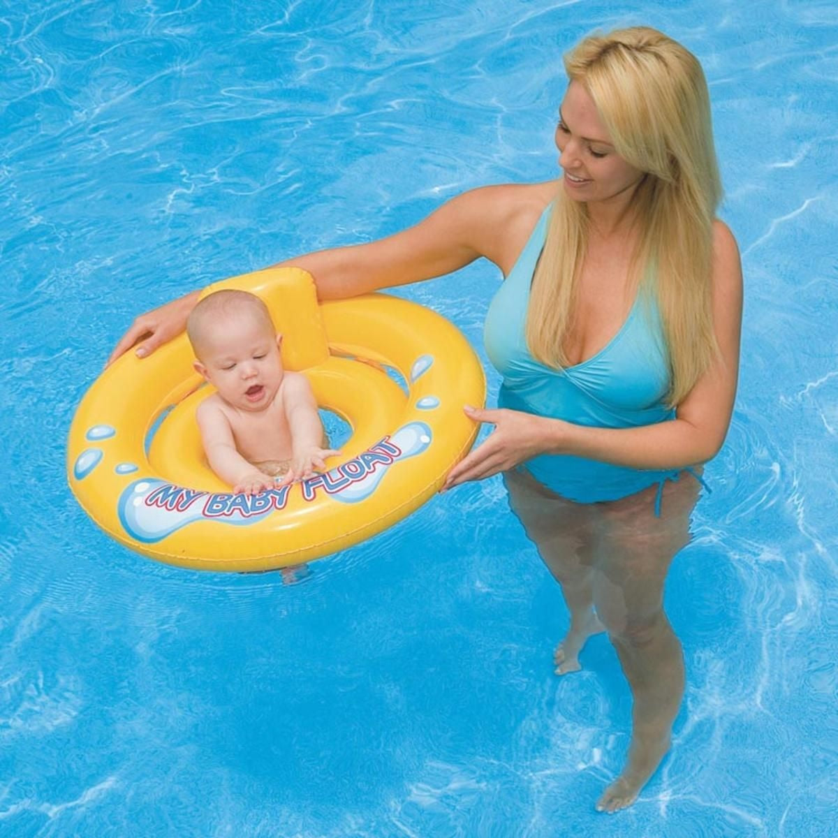 Round, yellow baby inflatable float.