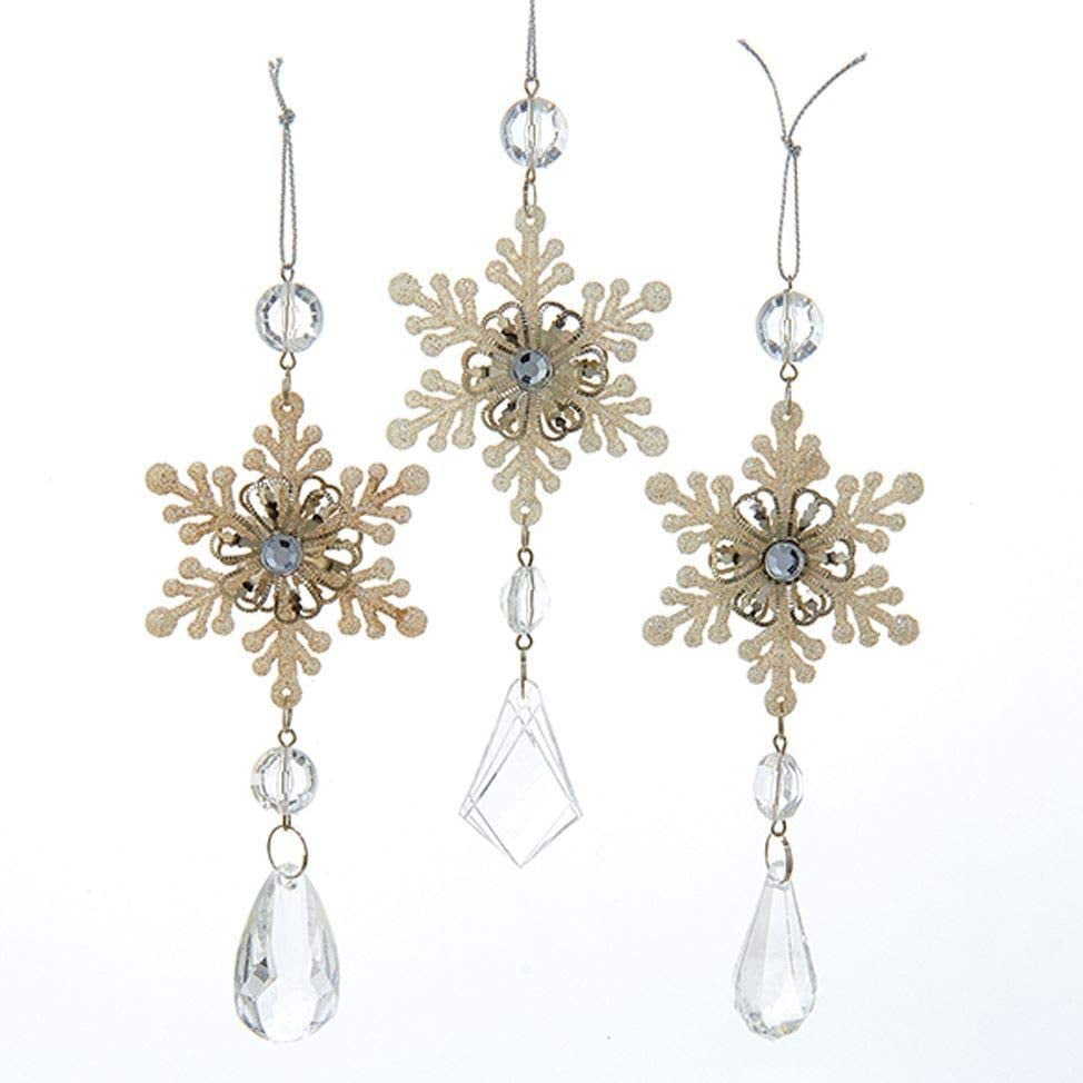 Snowflake ornaments with gems hanging underneath.