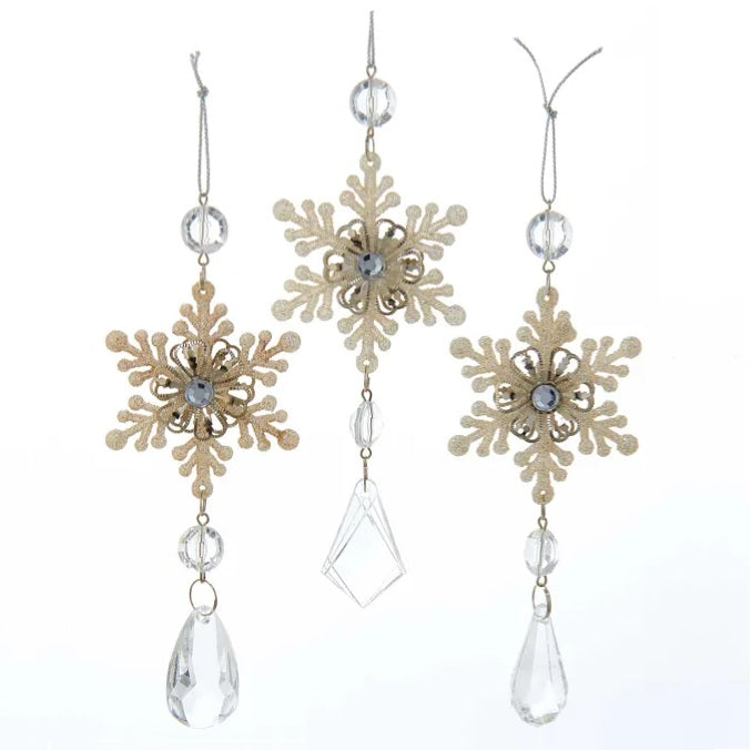 Snowflake ornaments with gems hanging underneath.