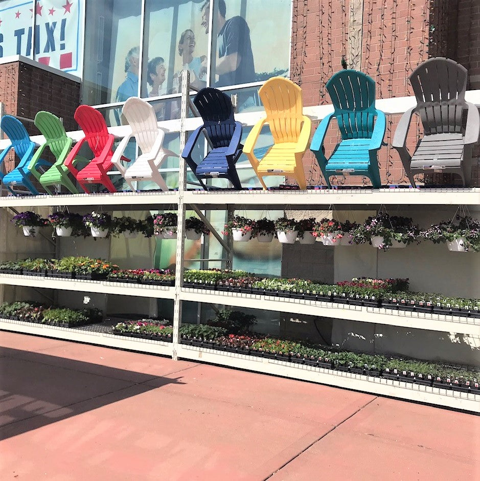 Adirondack chairs on display in front of the American Sale store in Orland Park, Illinois.