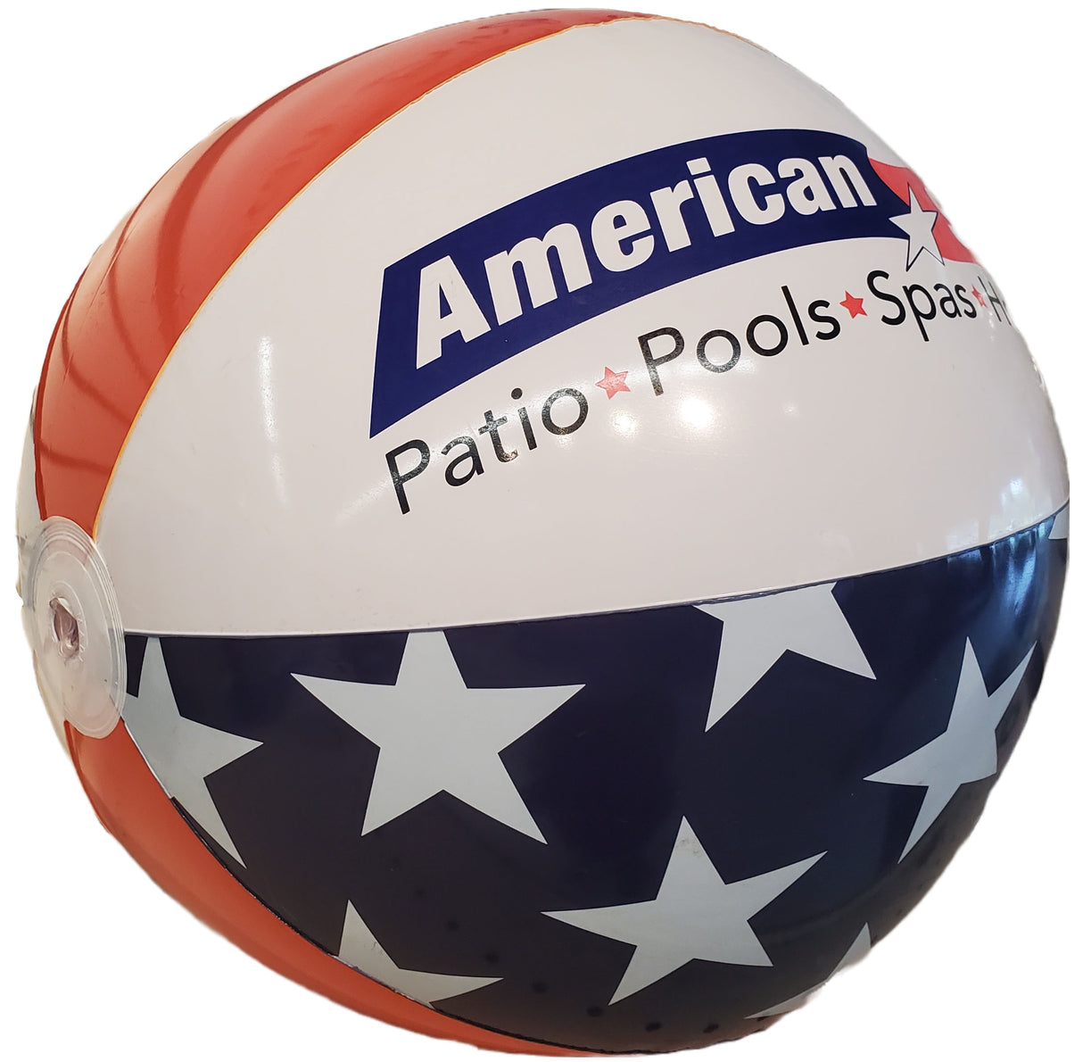 Inflatable beach ball with the American Sale logo on it. There are red, white and blue stripes and white stars. It also reads "Patio. Pools. Spas. Holiday."