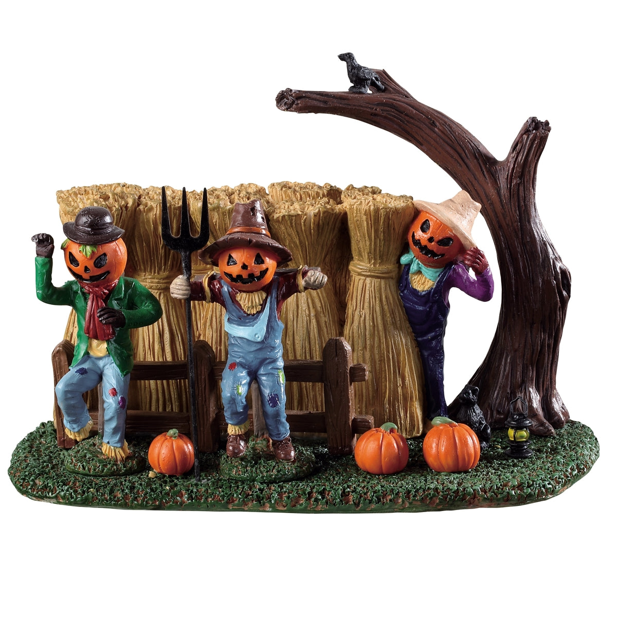 Polyresin village accent for a Lemax display. Designed to look like three scarecrows standing near bales of hay and pumpkins.