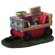 Polyresin wagon that reads "Take a Book, Leave a Book."