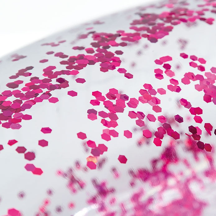 Clear inflatable inner tube with glitter inside. This tube has purple glitter.