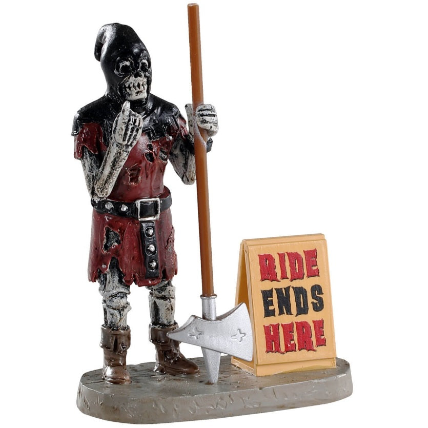 Polyresin figurine for a Lemax display. Designed to look like a skeleton wearing a black mask, red chainmail, a black belt and brown boots. He's holding a horsemen's axe and standing next to a sign that reads "RIDE ENDS HERE."