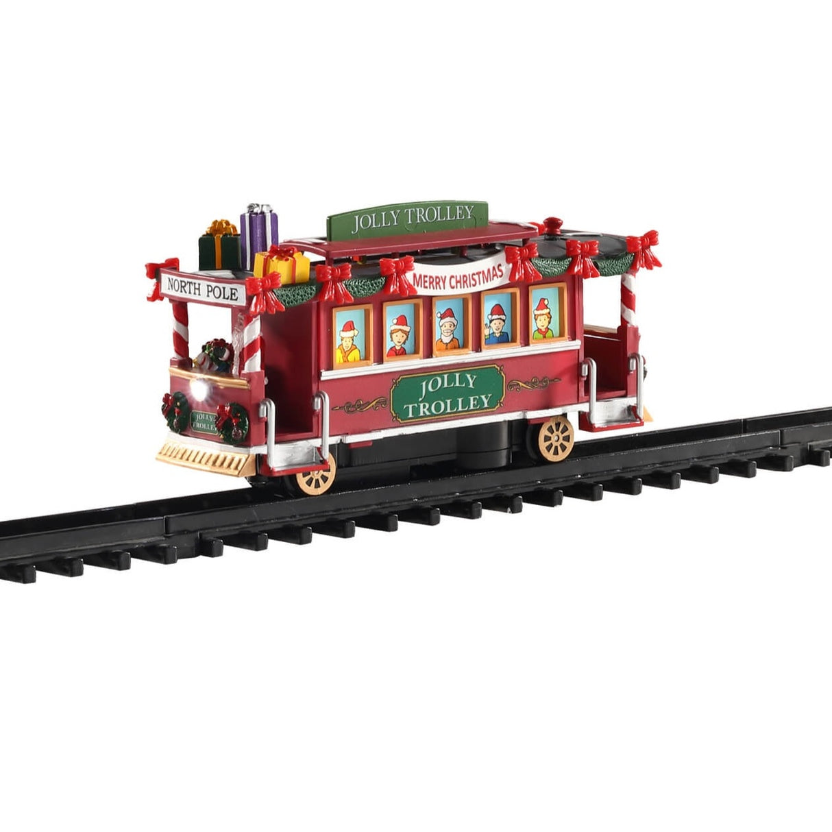 Plastic train for a Lemax Village tabletop display. Train is Christmas themed
