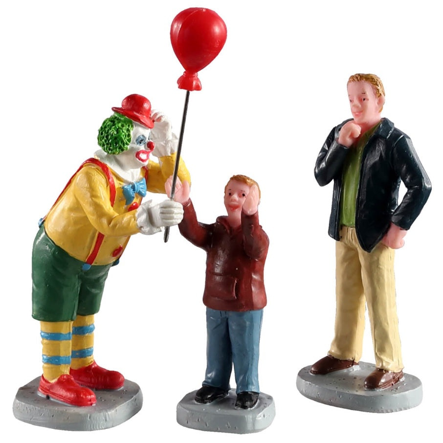 Polyresin figurines for a Lemax Village tabletop display. Designed to look like a clown handing a red balloon to a small child while a dad stands and watches