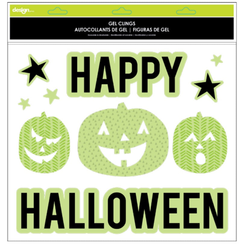 Glow in the dark window cling decorations for Halloween. One set reads "Happy Halloween" and features jack-o-lanterns and stars. One set features a bunch of different sized spiders. One set features a skull and cross bones with lightning. One set reads "Trick or Treat."
