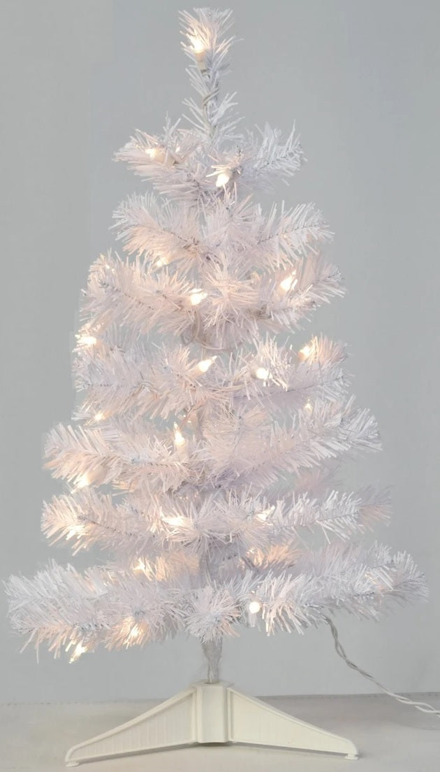 Small white tree with clear lights.