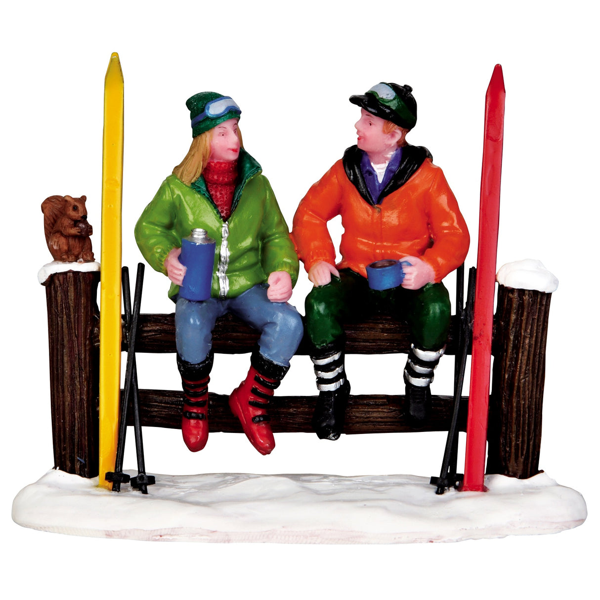 Polyresin figurine for a Lemax display. Designed to look like two people sitting on a wooden fence after a long day of skiing. There's a squirrel sitting on the fence.