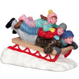 Polyresin figurine for a Lemax display. Designed to look like three kids going down a snowy hill on a sled. They're all wearing winter clothes.