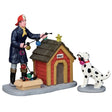 Polyresin figurines for a Lemax display. Designed to look like a young boy and a Dalmatian decorating a dog house for Christmas. They're putting multi-colored lights on the roof.