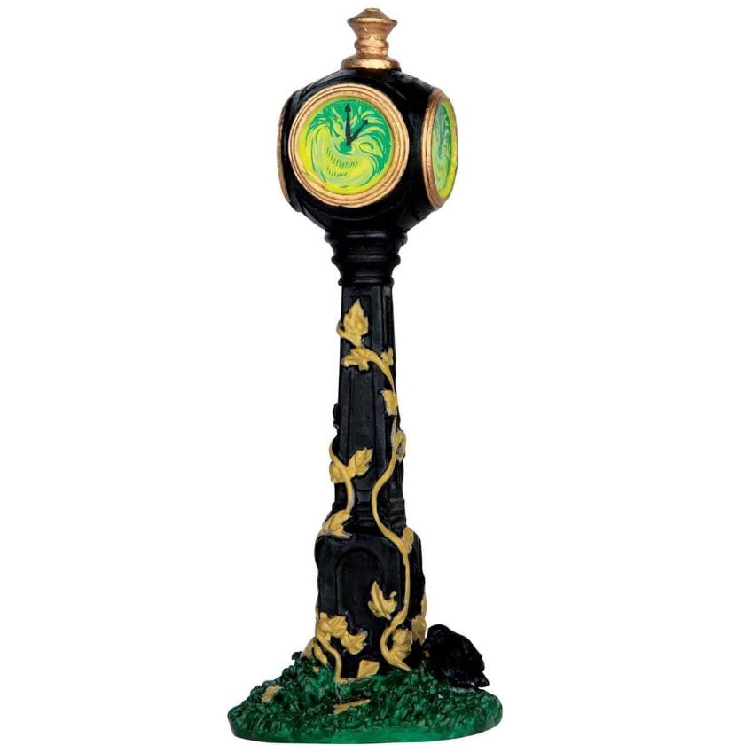 Polyresin village accent for a Lemax display. Designed to look like a tall, black clock with yellow vines growing up it. The clock head is a swirl of lime green and dark green.