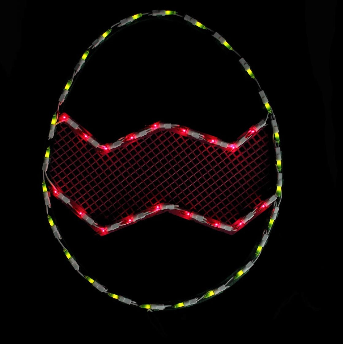 A window silhouette shaped like an egg. The colors are yellow and pink. The sign lights up