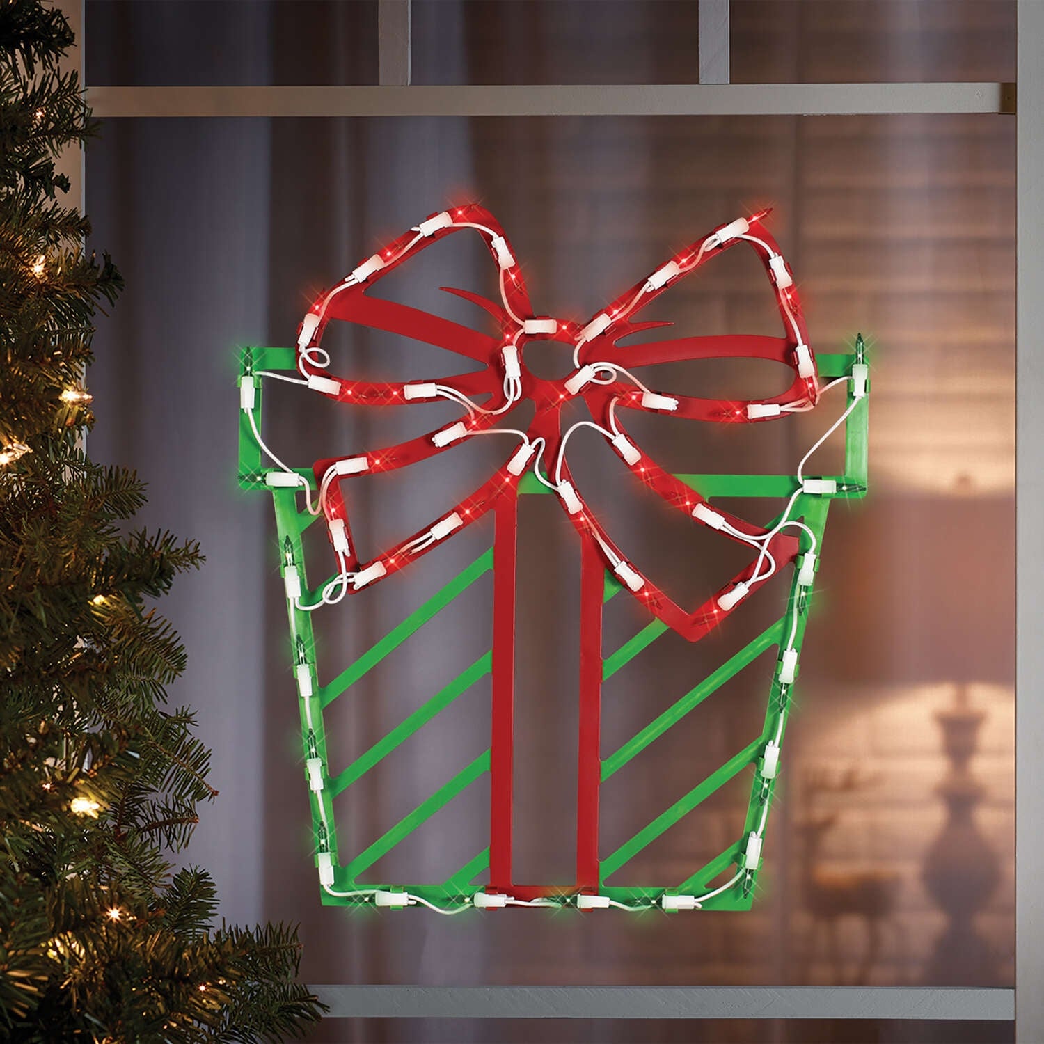 Illuminated Present Window Silhouette