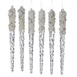 Ornaments shaped like icicles. Covered in white and silver glitter.