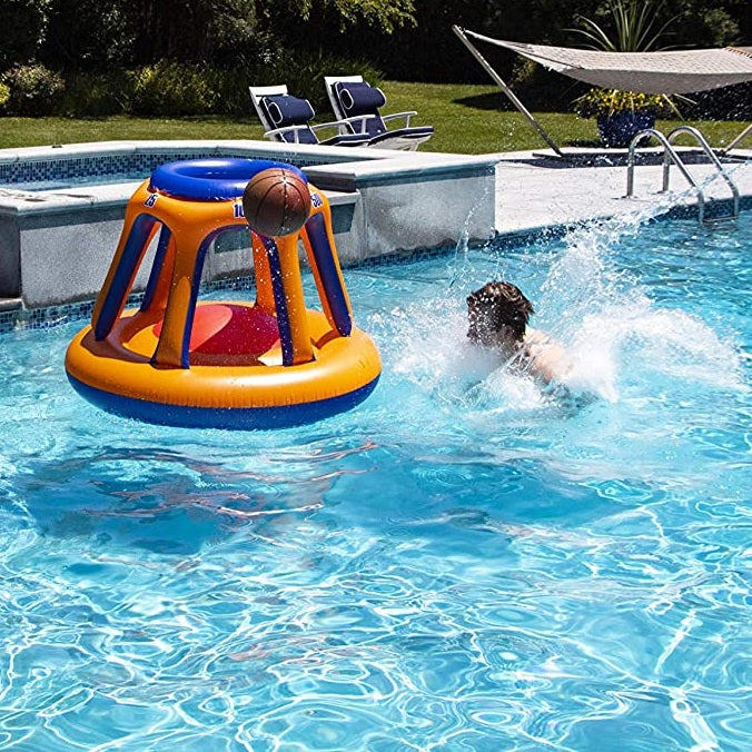 Pool inflatable shaped like a blue and orange basketball hoop.
