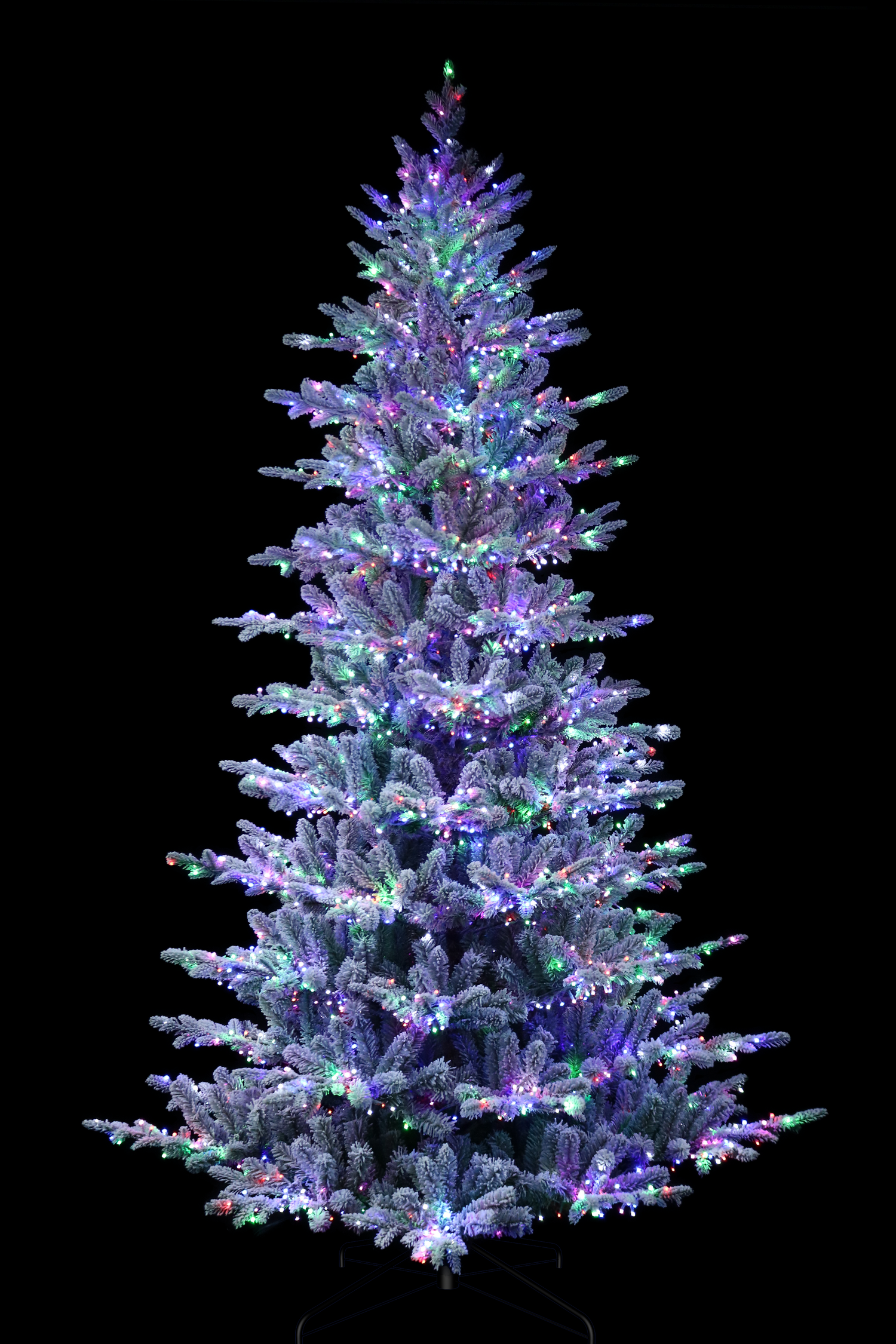 Artificial tree pre-lit with Starry lights. Branches are covered in white to appear covered in snow.
