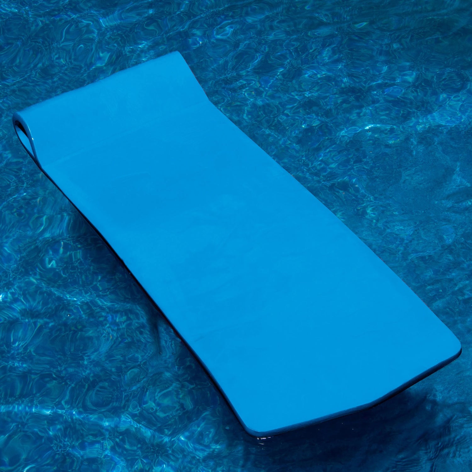 Blue foam pool mattress.