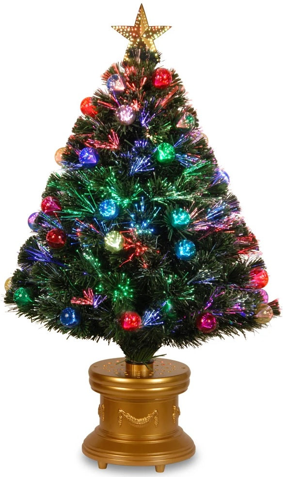 Fiber optic tree with multi-colored ornaments on it and a star up top.