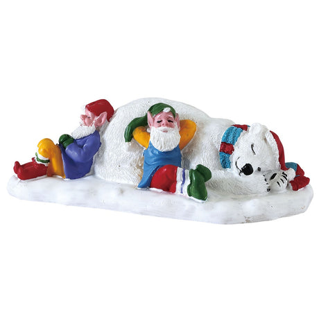 Village accent for a Lemax display. Designed to look like two elves leaning up against a polar bear. They're all napping.