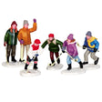 Polyresin figurines for a Lemax Village display. Designed to look like four kids ice skating and playing hockey while two adults cheer them on.