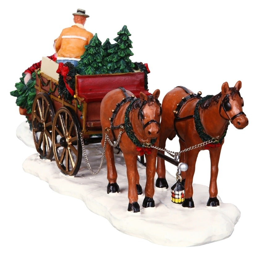 Polyresin figurine for a Lemax display. Designed to look like two horses pulling a carriage that holds trees. There are two men putting the trees in the carriage. The wagon is decorated with multi-colored lights and decorated wreaths. Both men are wearing winter clothes and hats.