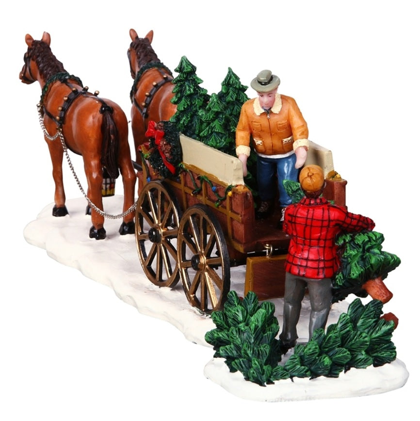 Polyresin figurine for a Lemax display. Designed to look like two horses pulling a carriage that holds trees. There are two men putting the trees in the carriage. The wagon is decorated with multi-colored lights and decorated wreaths. Both men are wearing winter clothes and hats.