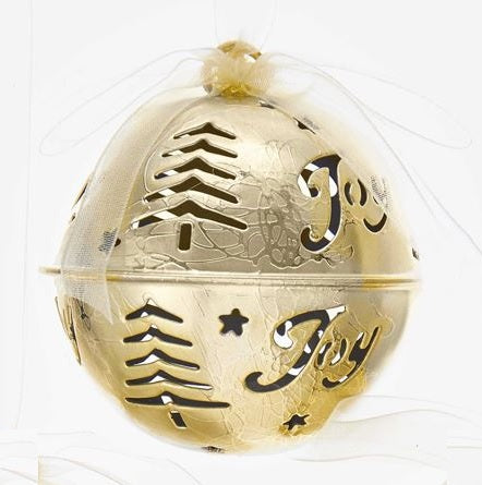 Gold bell ornament. There are tree and star cutouts and cutouts that read "JOY."