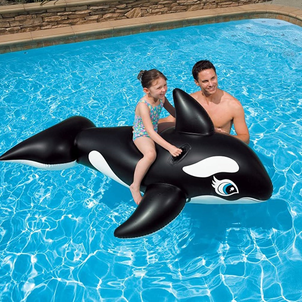 Pool inflatable shaped like a whale.