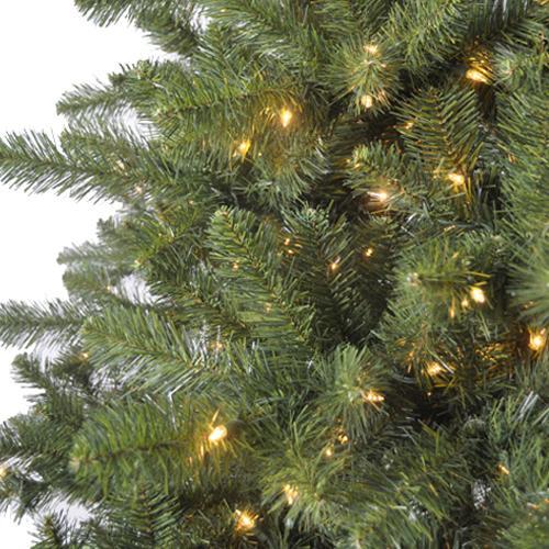 Artificial tree pre-lit with clear lights.