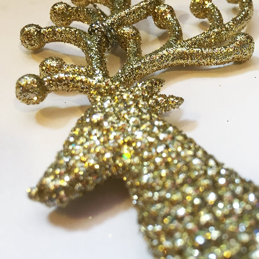 Gold ornaments shaped like reindeer.