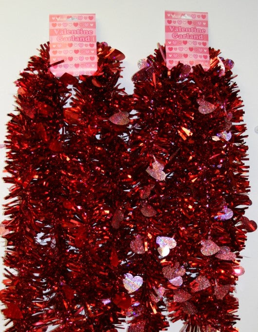 Red decorating tinsel with red and pink holographic hearts.