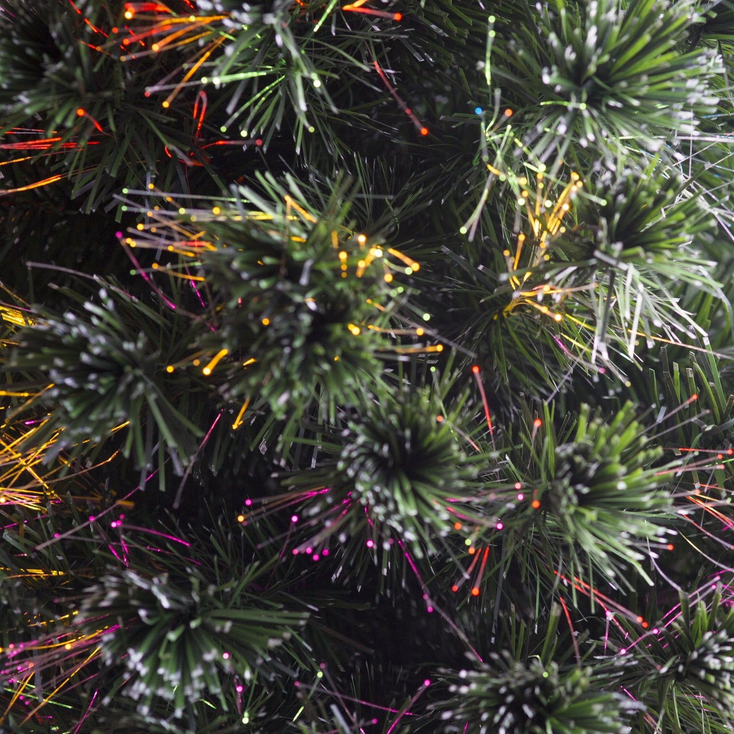 4 ft. fiber optic tree with a gold base and a star on top.