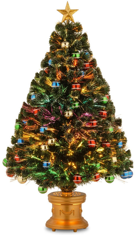 4 ft. fiber optic tree with multi-colored, glittered ball ornaments and a gold base.