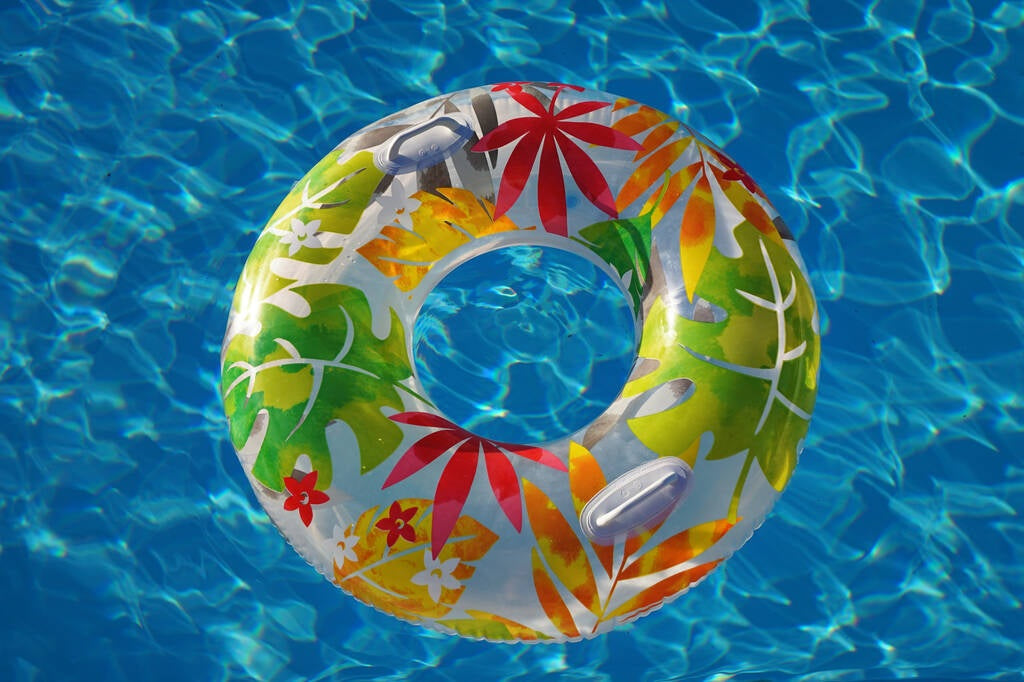 Inner tube detailed with tropical leaves.