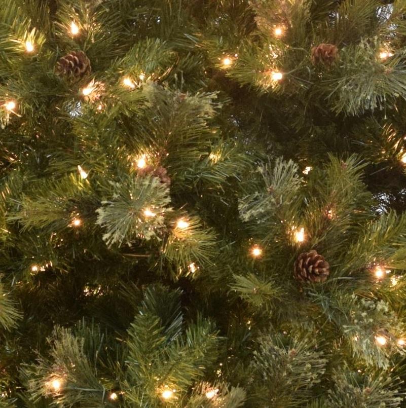 Artificial tree pre-lit with clear lights.