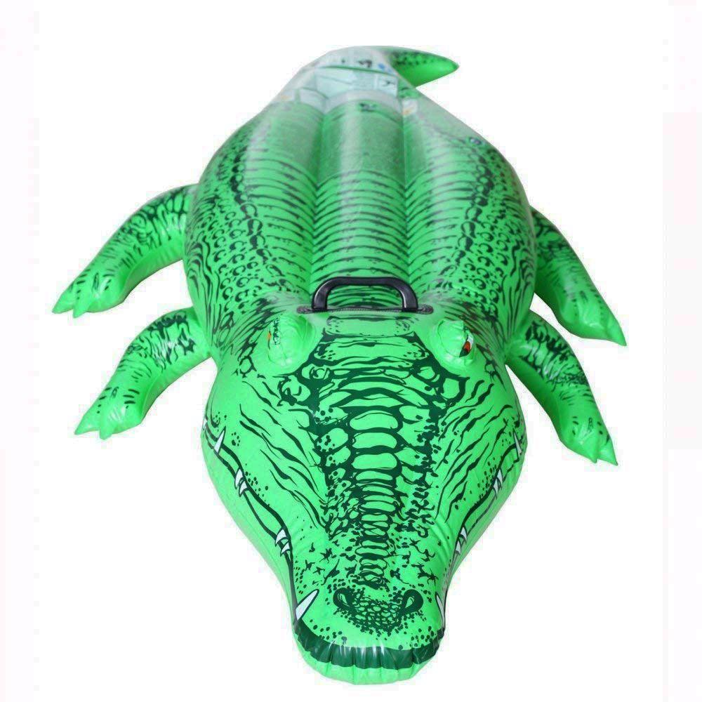 Pool inflatable shaped like an alligator.