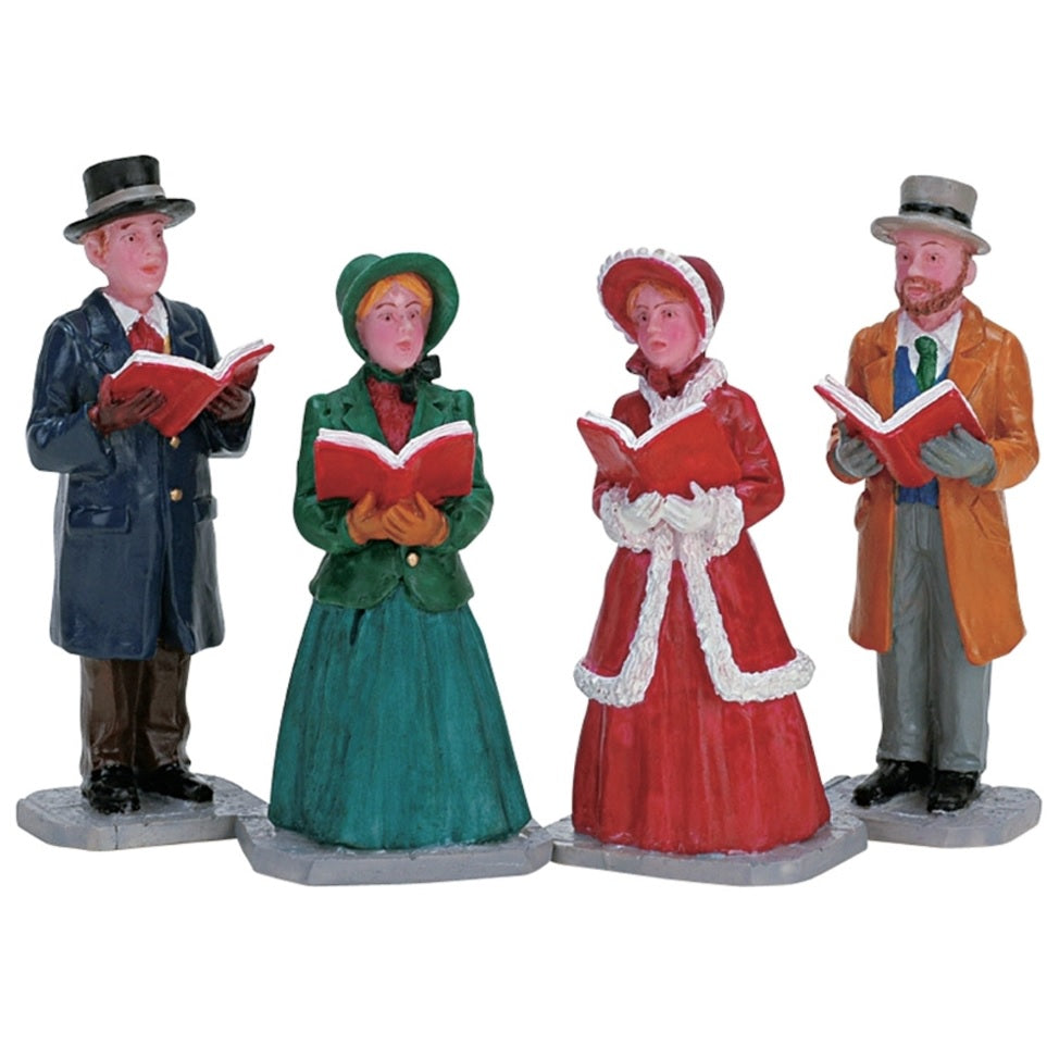 Village figurines for a Lemax display. Designed to look like four people in Victorian-era clothing, singing in a choir.